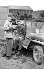 Shemya Post Engineer's Mail Clerk Tom Barron (sitting) with Ian Beaton. [Ian Beaton]